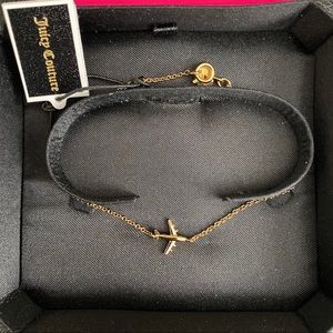 Gold Airplane Juicy Couture bracelet